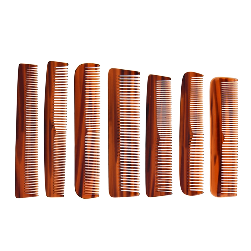 comb-with-metal-pick<!--[